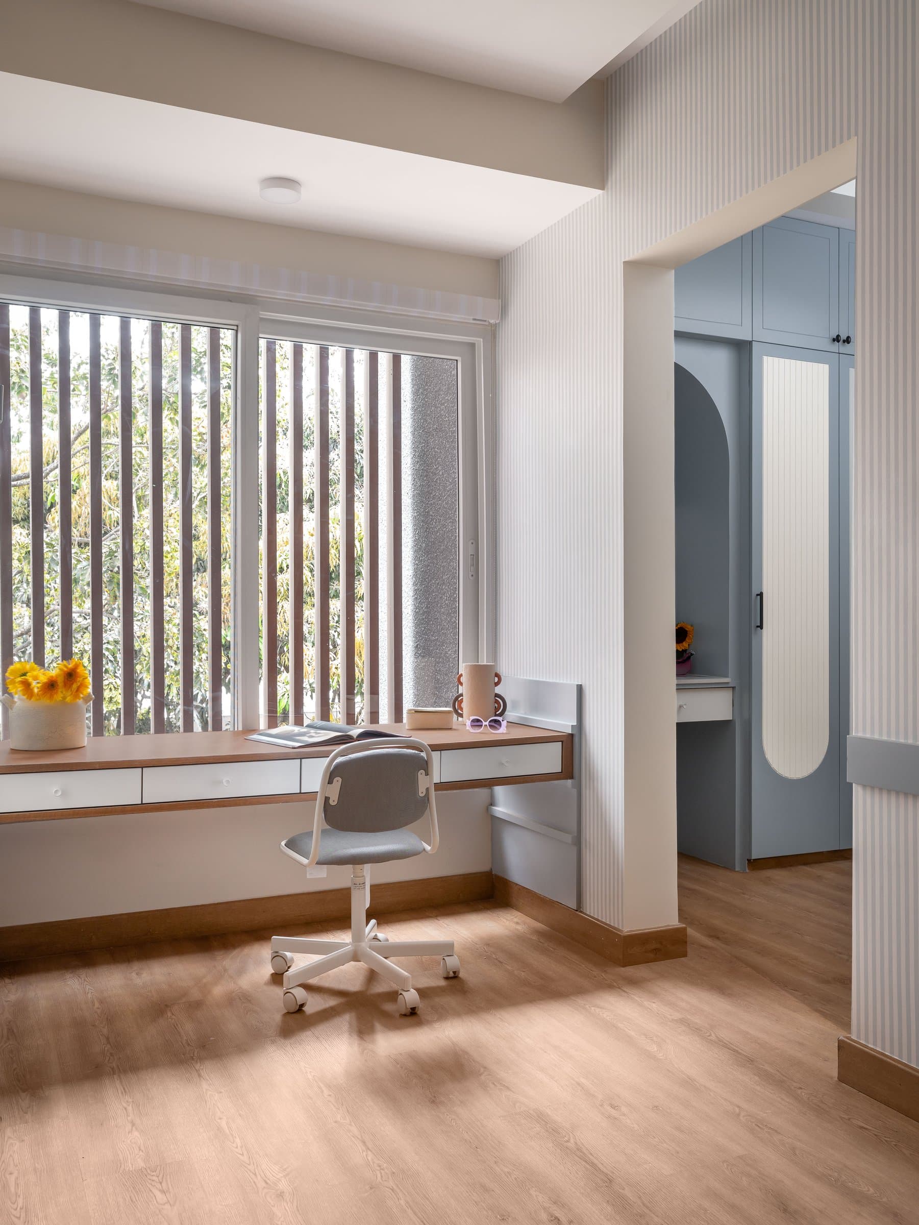 The study nook, holding the bunk room's colour story at a quieter pitch