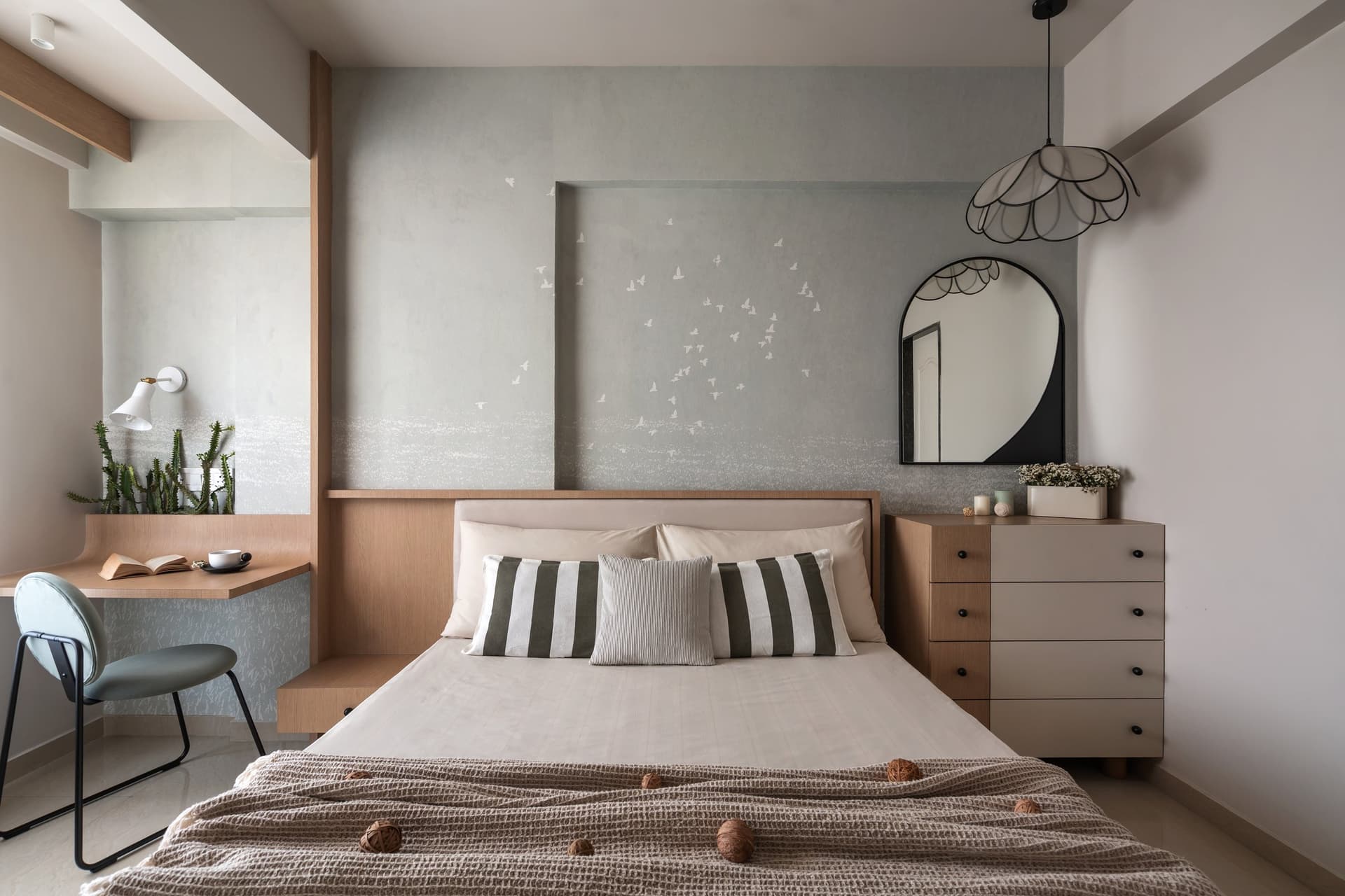 The bedroom, where a delicate flying-bird motif echoes the mangrove views beyond