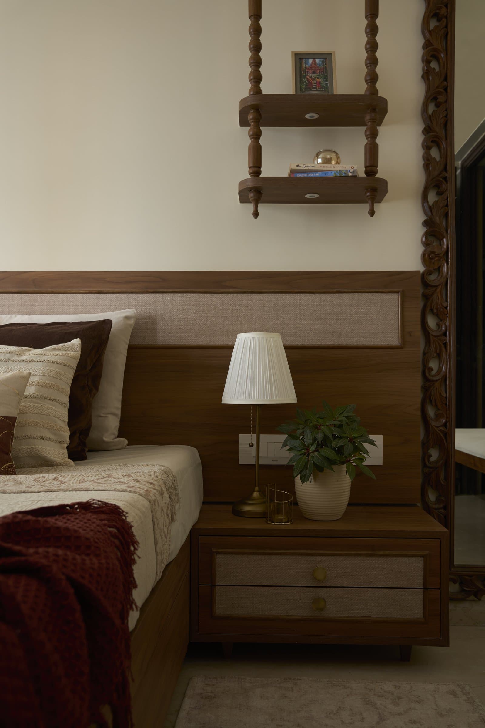 A closer view of the bedside, where restraint itself becomes a form of ornament