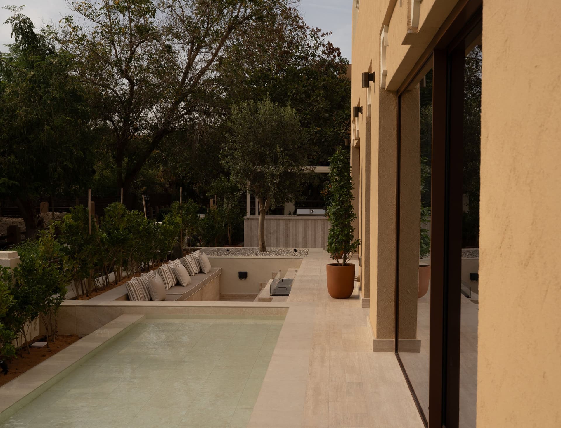 An interior moment from a Design Edit project, where natural stone, warm timber tones, and considered joinery establish the studio’s material vocabulary