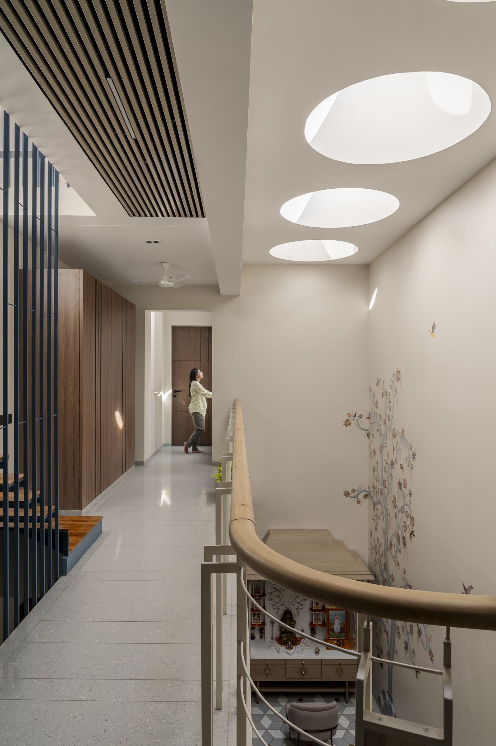 The central skylight, where a sequence of oval openings brings changing daylight to each floor
