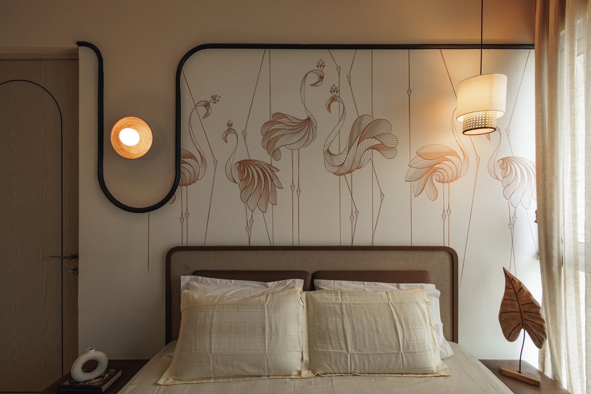 The master bedroom, centred on a sepia-toned wallpaper and framed by a single looping black line