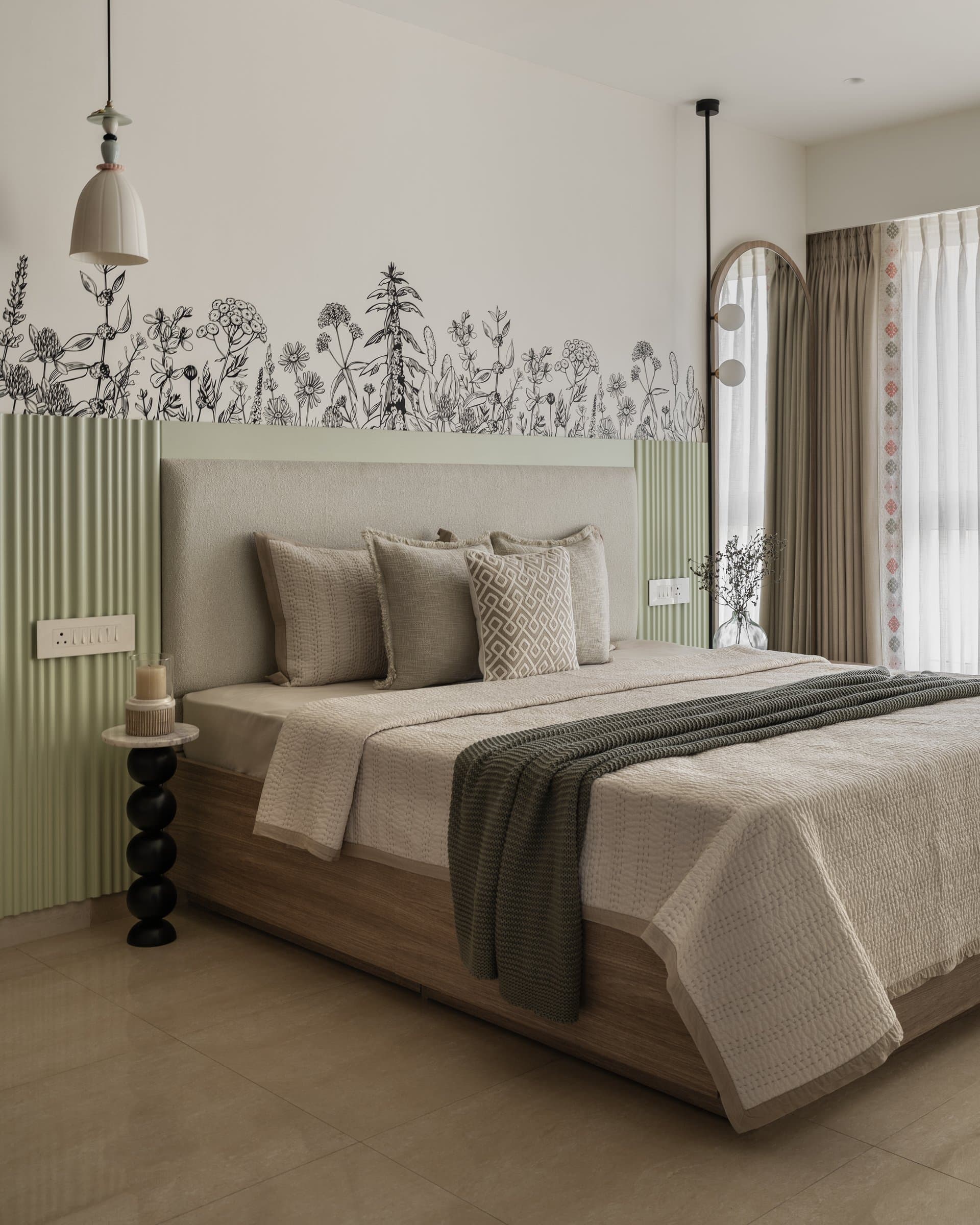The second bedroom, where sage-green fluted panels and botanical linework define a layered composition