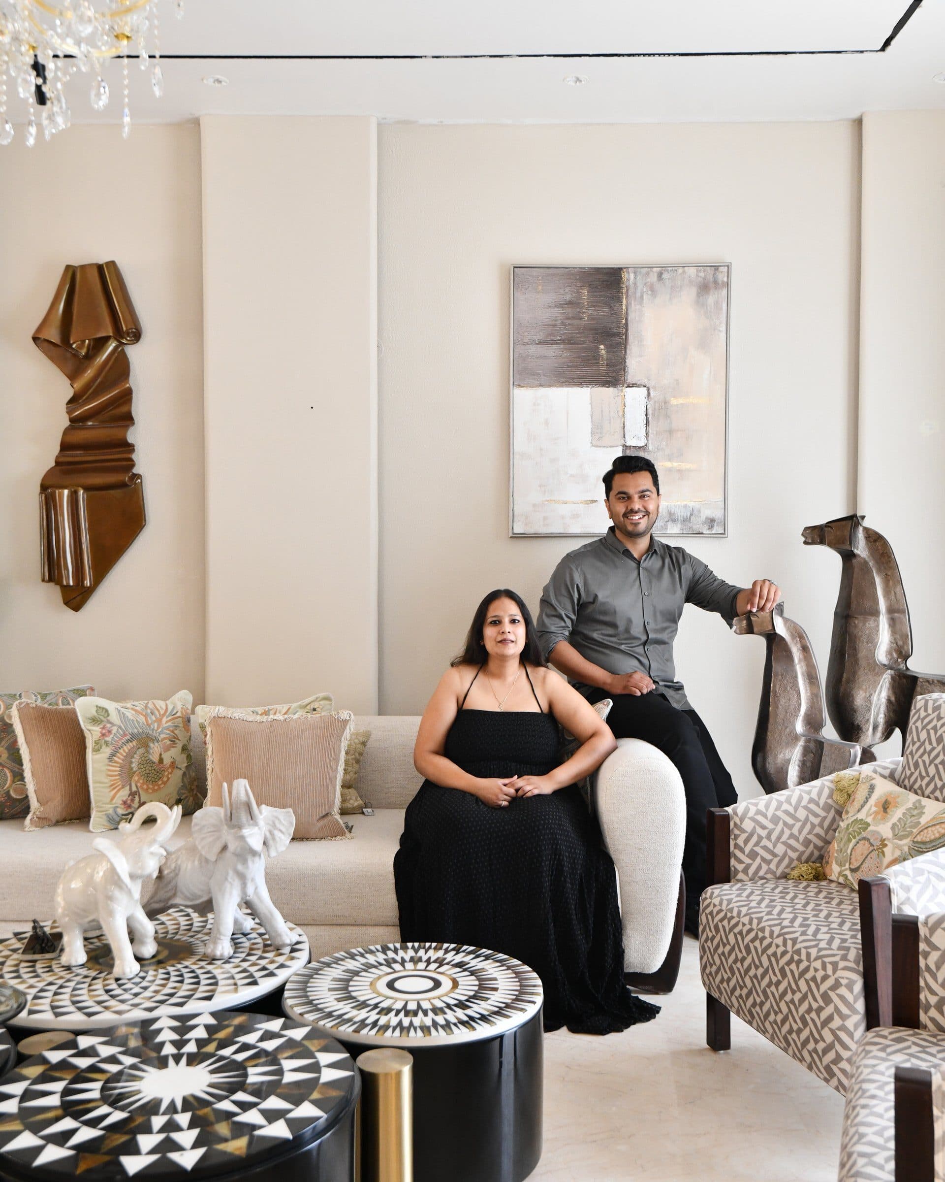 The principal designers Tanvi Singhal and Sudhanshu Nagpal, within the formal living room they conceived around sculptural seating and inlaid tables