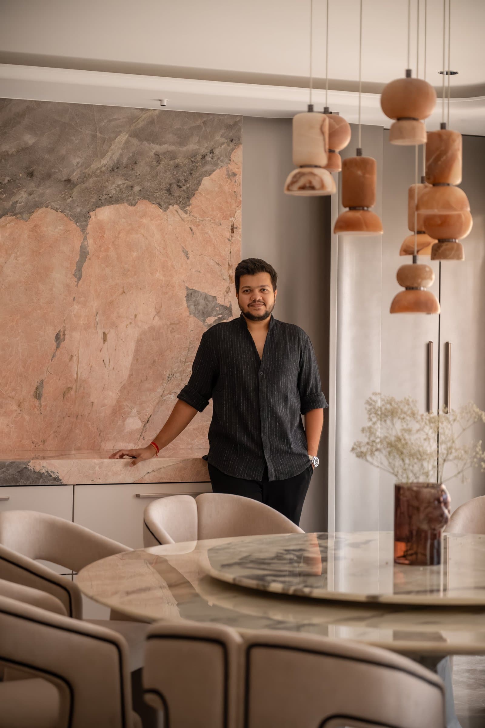 Pranay Shah of DG Studio Architects, photographed within the residence he designed with Tanvi Shah
