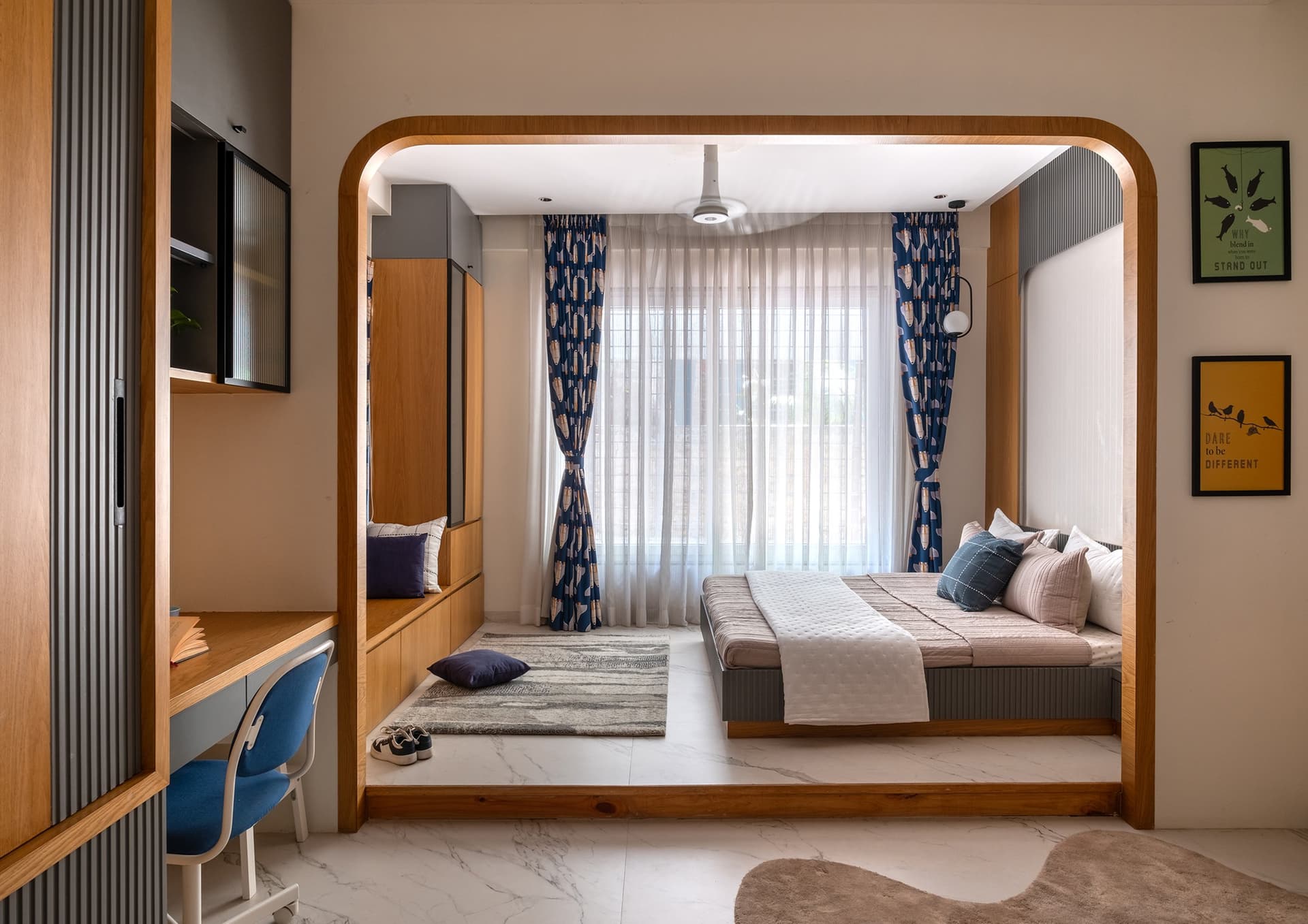 The children's bedroom, organised around an arched wooden portal that frames the raised sleeping platform