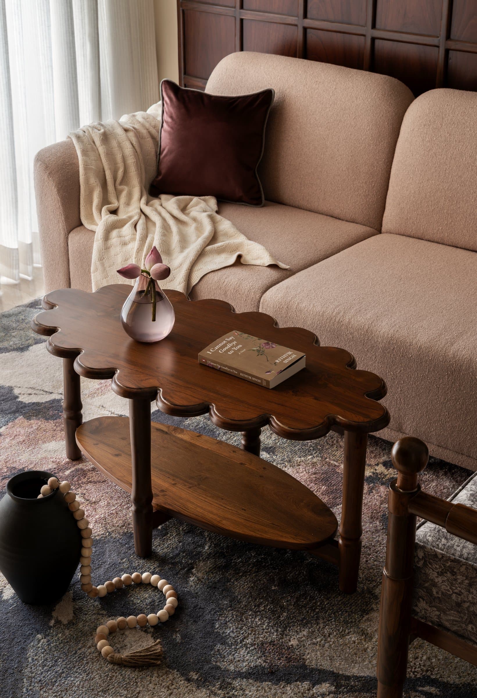 A closer view of the scallop-edged coffee table, one of several bespoke pieces developed for the home