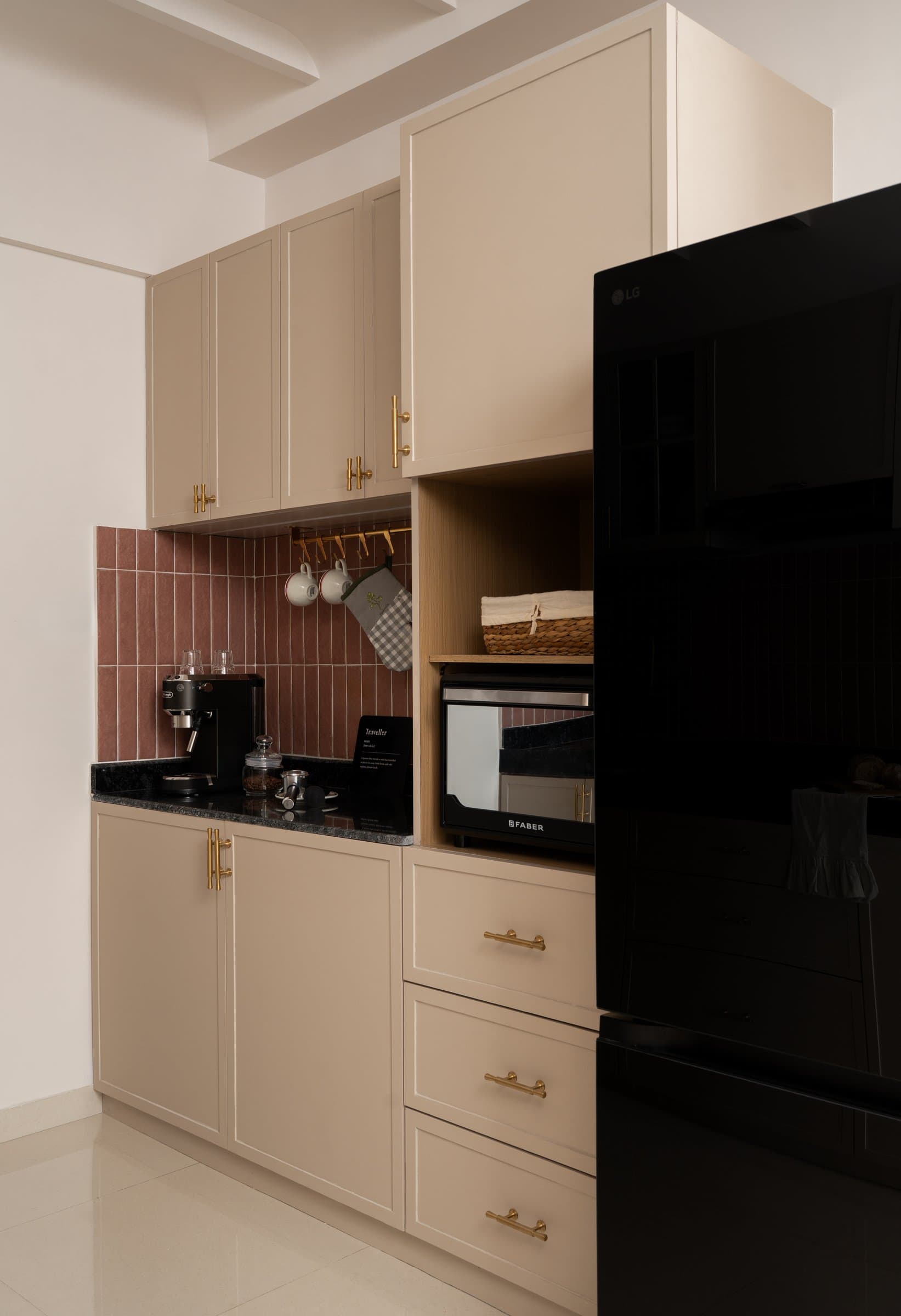 The adjacent kitchen run, with a coffee station set into the joinery