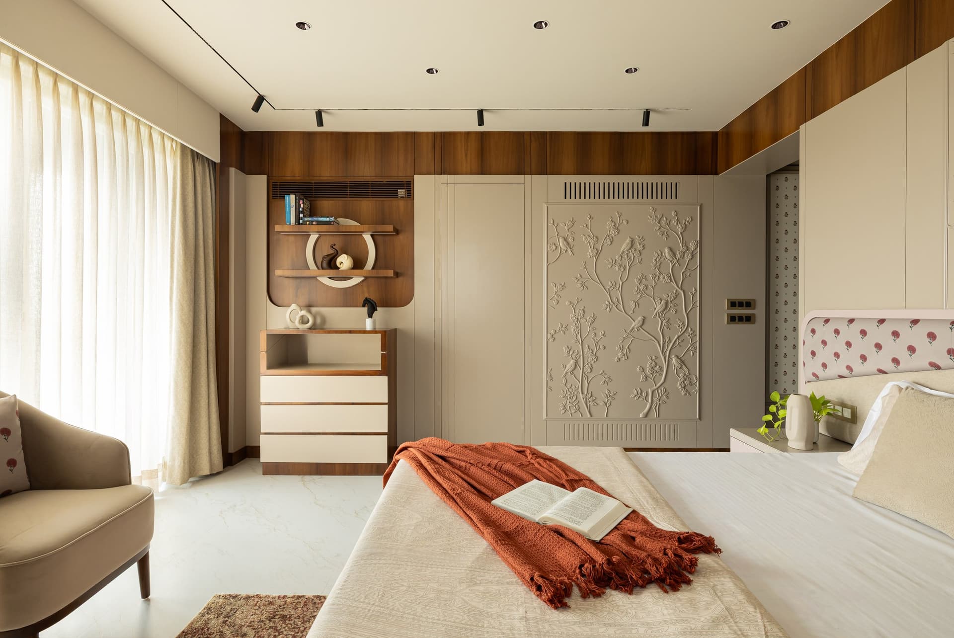 From the foot of the bed, the room's compositional discipline becomes more fully apparent